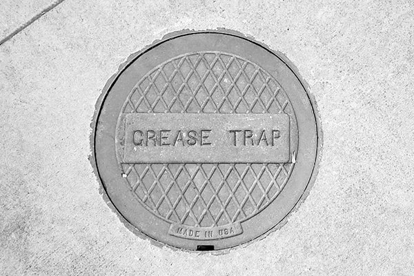neglecting grease trap pumping can lead to costly plumbing issues, foul odors, and health code violations